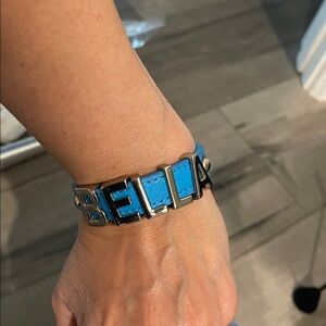 Bracelet, blue leather with BELLA sign